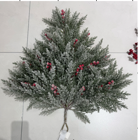 Christmas branch with snow and berries